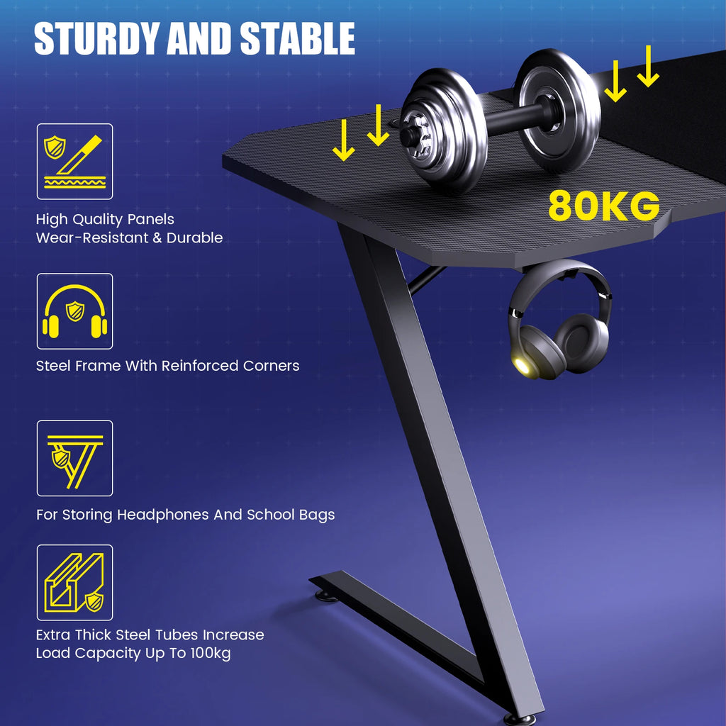 Escritorio para juegos GTPLAYER, 120 x 60 cm, para PC, con superficie de fibra de carbono, LED y enchufe, color negro